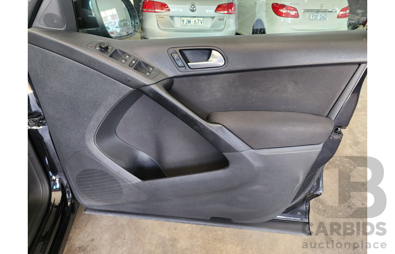 6/2015 Volkswagen Tiguan 118 TSI (4x2) 5NC MY15 4d Wagon Black 1.4L