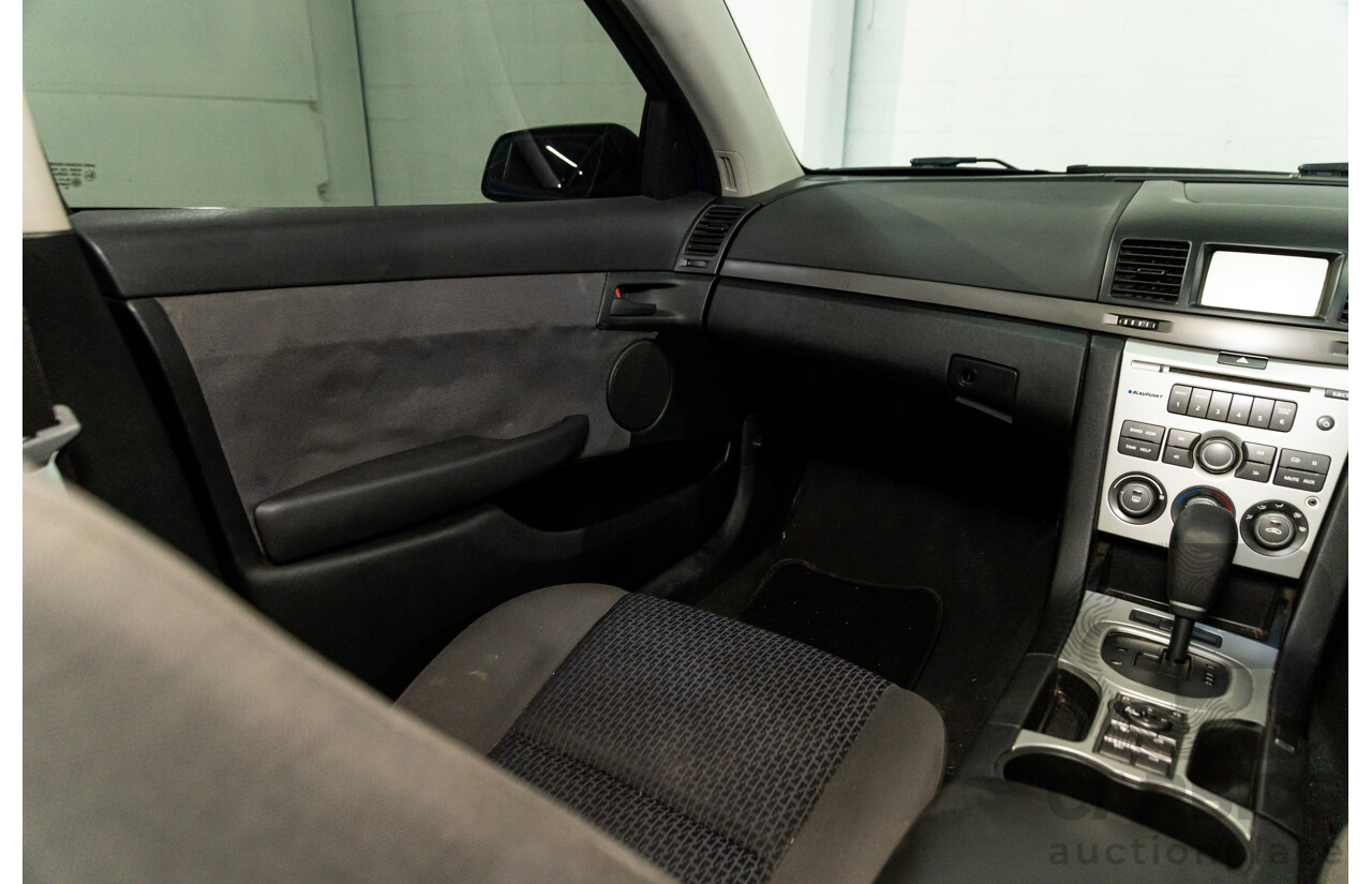 9/2009 Holden Commodore Omega VE MY10 4d Sedan Voodoo Blue Metallic V6 3.0L