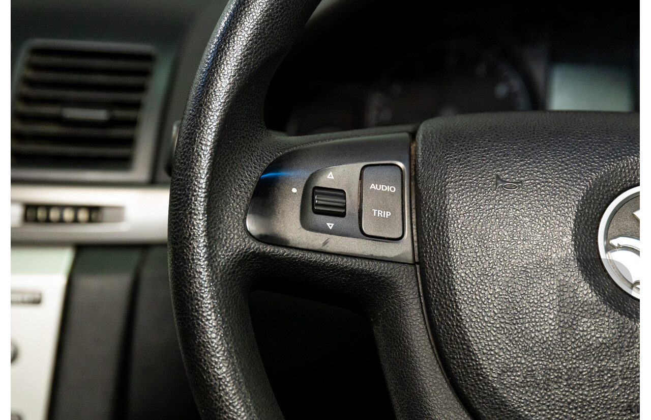 9/2009 Holden Commodore Omega VE MY10 4d Sedan Voodoo Blue Metallic V6 3.0L