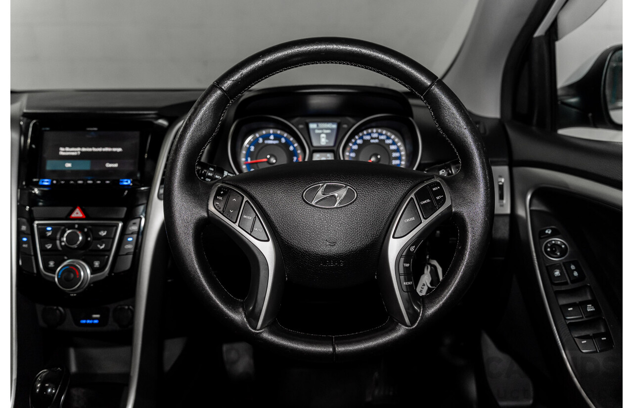 2/2015 Hyundai i30 SE GD MY14 5d Hatchback Creamy White 1.8L