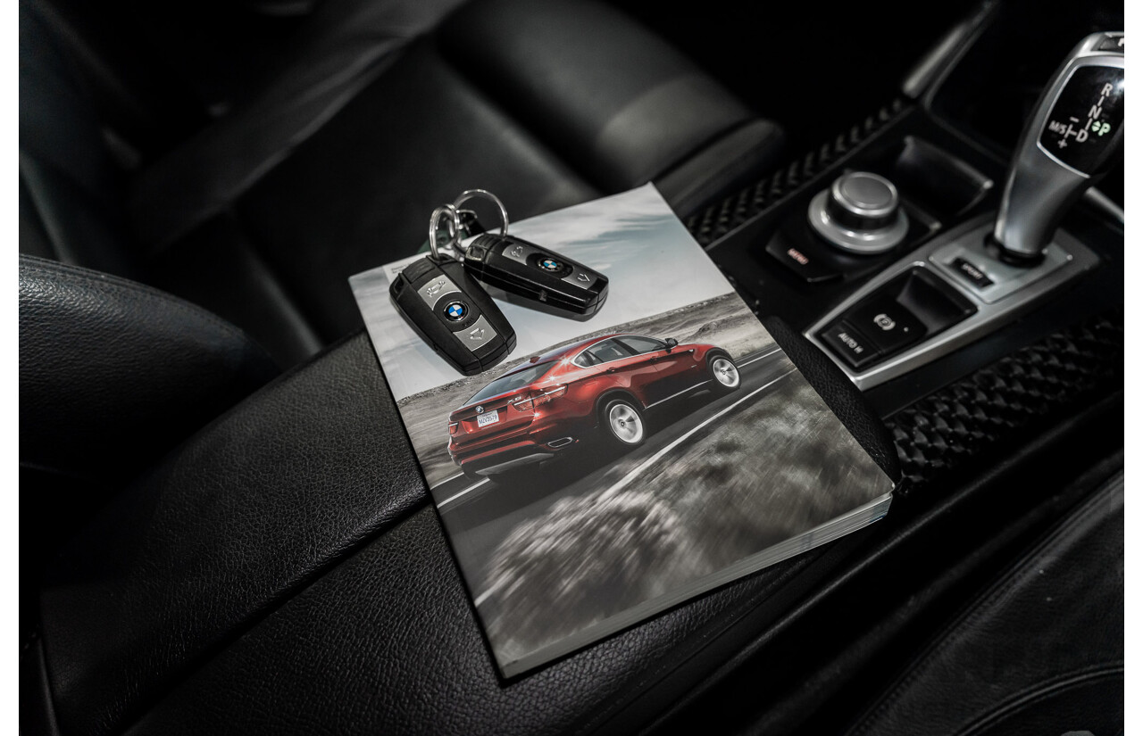 10/2009 BMW X6 xDrive35d E71 4d Coupe Vermillion Red Metallic Turbo Diesel 3.0L