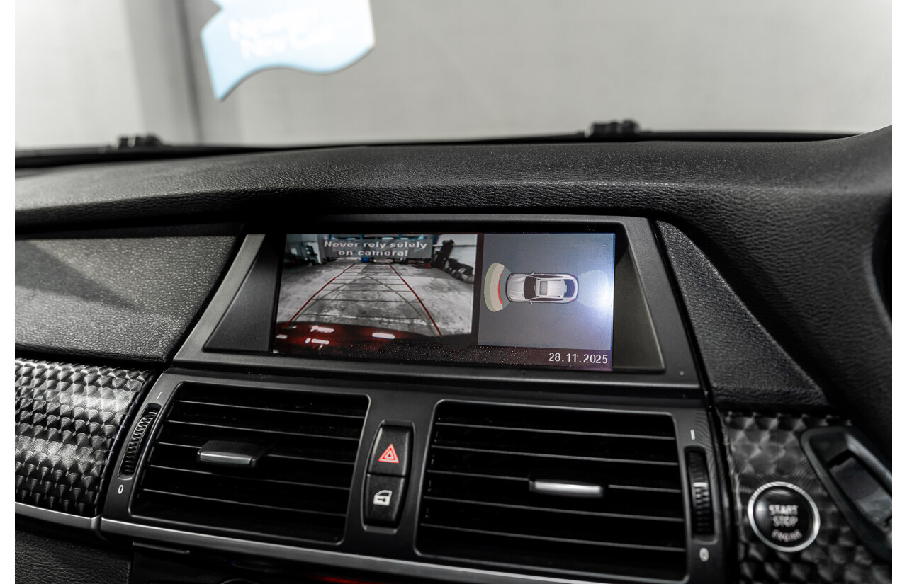 10/2009 BMW X6 xDrive35d E71 4d Coupe Vermillion Red Metallic Turbo Diesel 3.0L