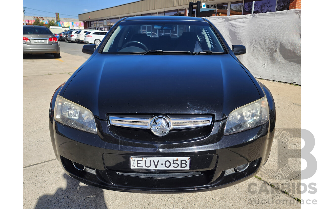 2/2010 Holden Berlina  VE MY10 4d Sedan Black 3.0L