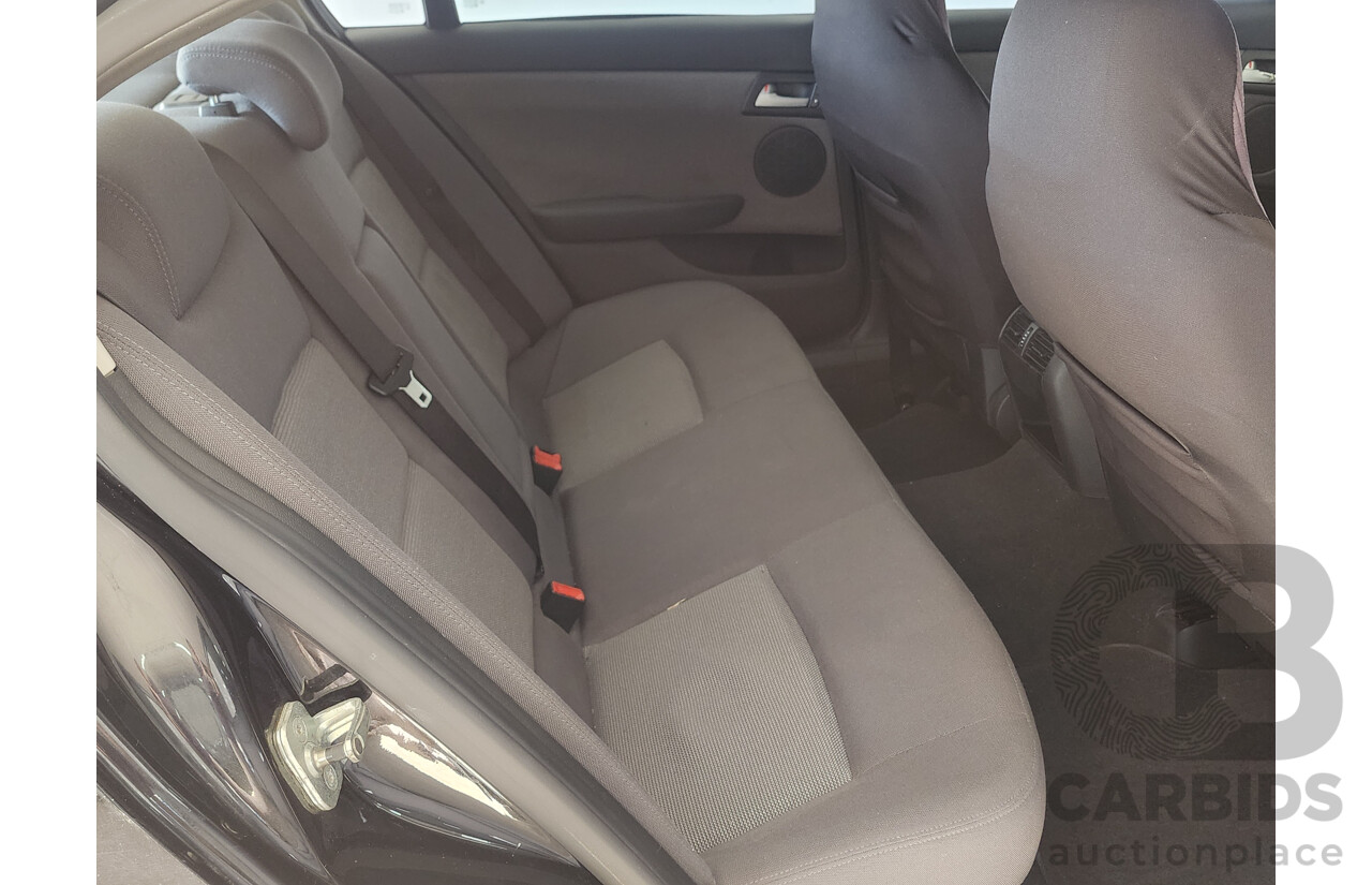 2/2010 Holden Berlina  VE MY10 4d Sedan Black 3.0L