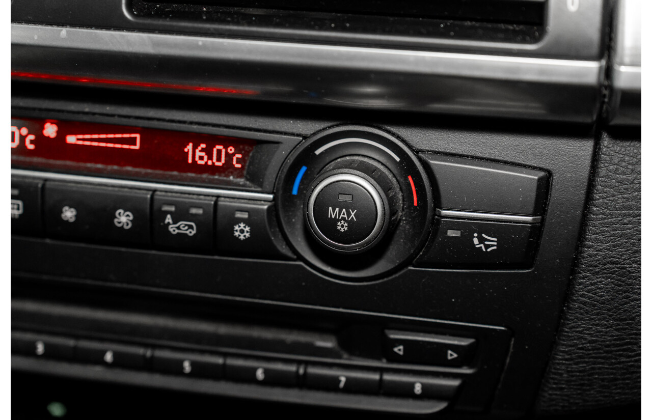 7/2010 BMW X5 xDrive40d Sport E70 MY10 4d Wagon Black Sapphire Metallic Twin Turbo Diesel 3.0L