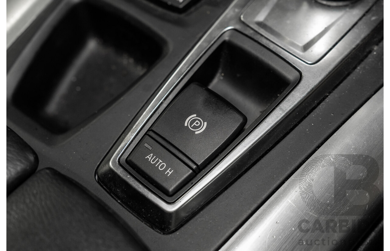 7/2010 BMW X5 xDrive40d Sport E70 MY10 4d Wagon Black Sapphire Metallic Twin Turbo Diesel 3.0L