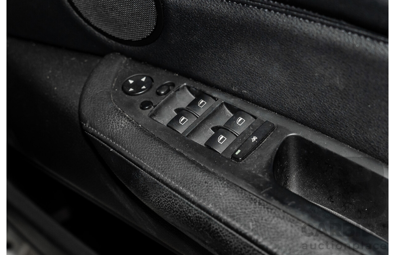 7/2010 BMW X5 xDrive40d Sport E70 MY10 4d Wagon Black Sapphire Metallic Twin Turbo Diesel 3.0L