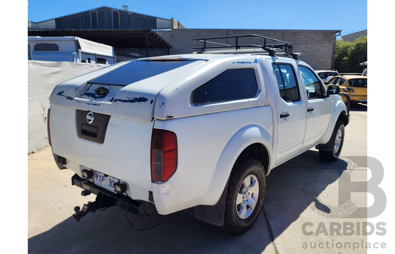 2/2009 Nissan Navara RX (4x4) D40 Dual Cab P/Up White 2.5L