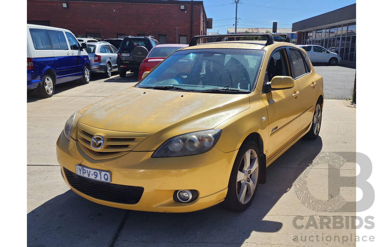 11/2004 Mazda Mazda3 SP23 BK 5d Hatchback Yellow 2.3L