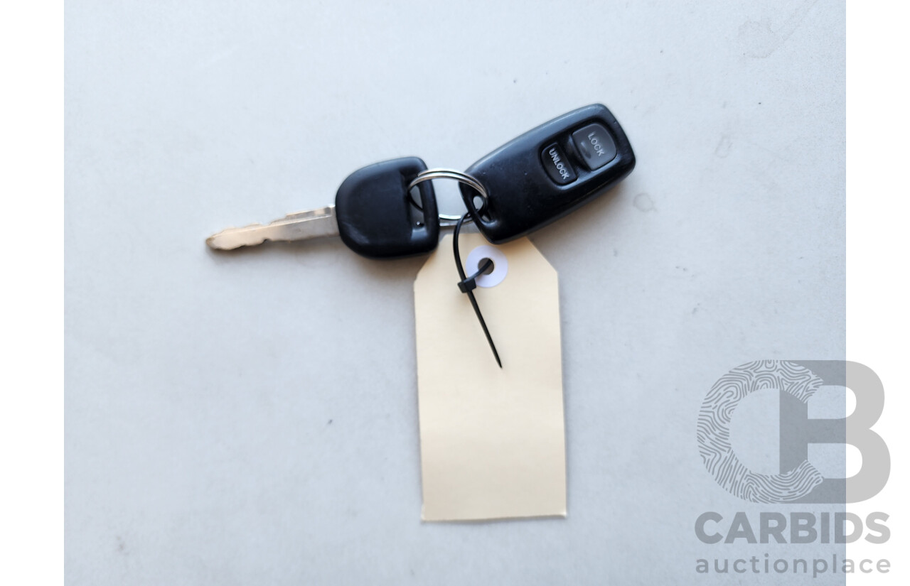 11/2004 Mazda Mazda3 SP23 BK 5d Hatchback Yellow 2.3L