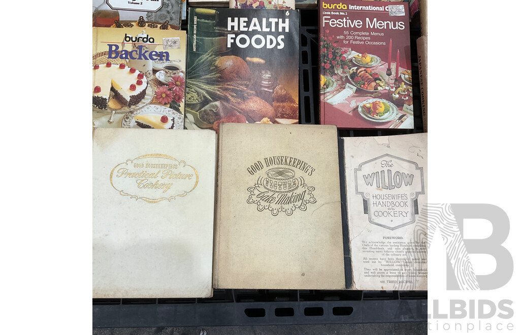 Collection of Vintage Cookbooks Spanning Various Cuisines and Baking Styles