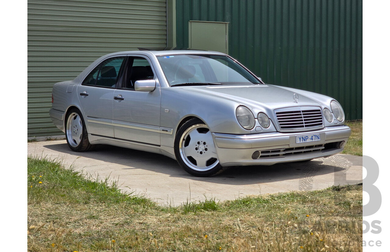 10/1998 Mercedes Benz E55 AMG W210 4d Sedan Brilliant Silver Metallic V8 5.4L