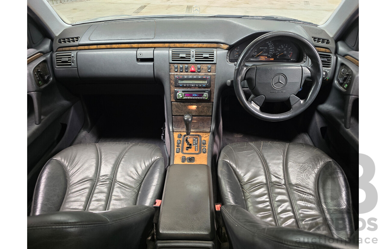 10/1998 Mercedes Benz E55 AMG W210 4d Sedan Brilliant Silver Metallic V8 5.4L