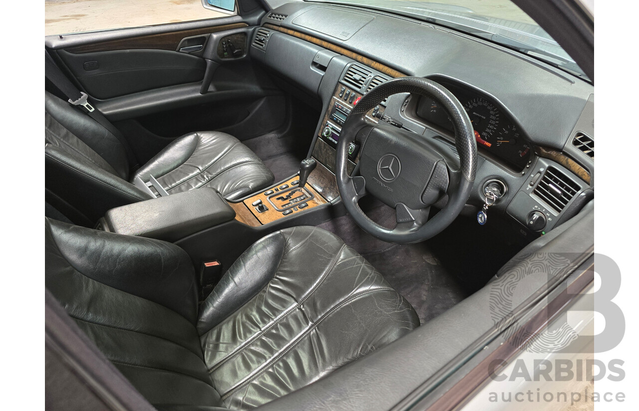 10/1998 Mercedes Benz E55 AMG W210 4d Sedan Brilliant Silver Metallic V8 5.4L