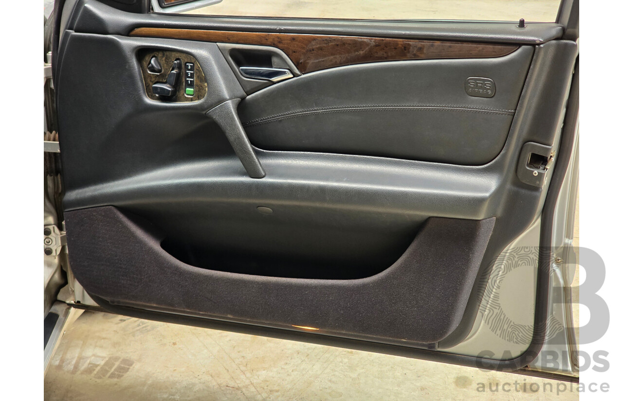 10/1998 Mercedes Benz E55 AMG W210 4d Sedan Brilliant Silver Metallic V8 5.4L