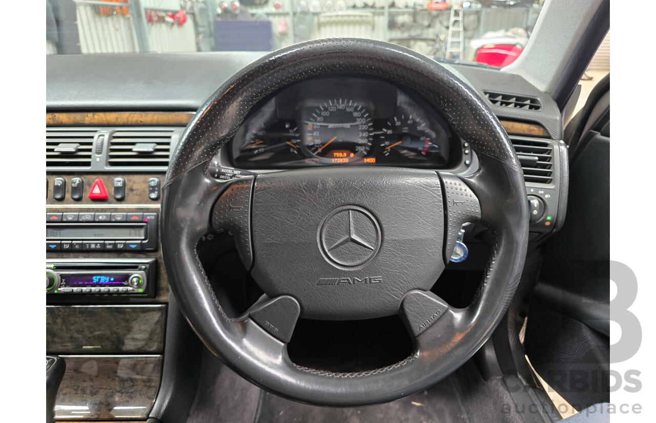 10/1998 Mercedes Benz E55 AMG W210 4d Sedan Brilliant Silver Metallic V8 5.4L