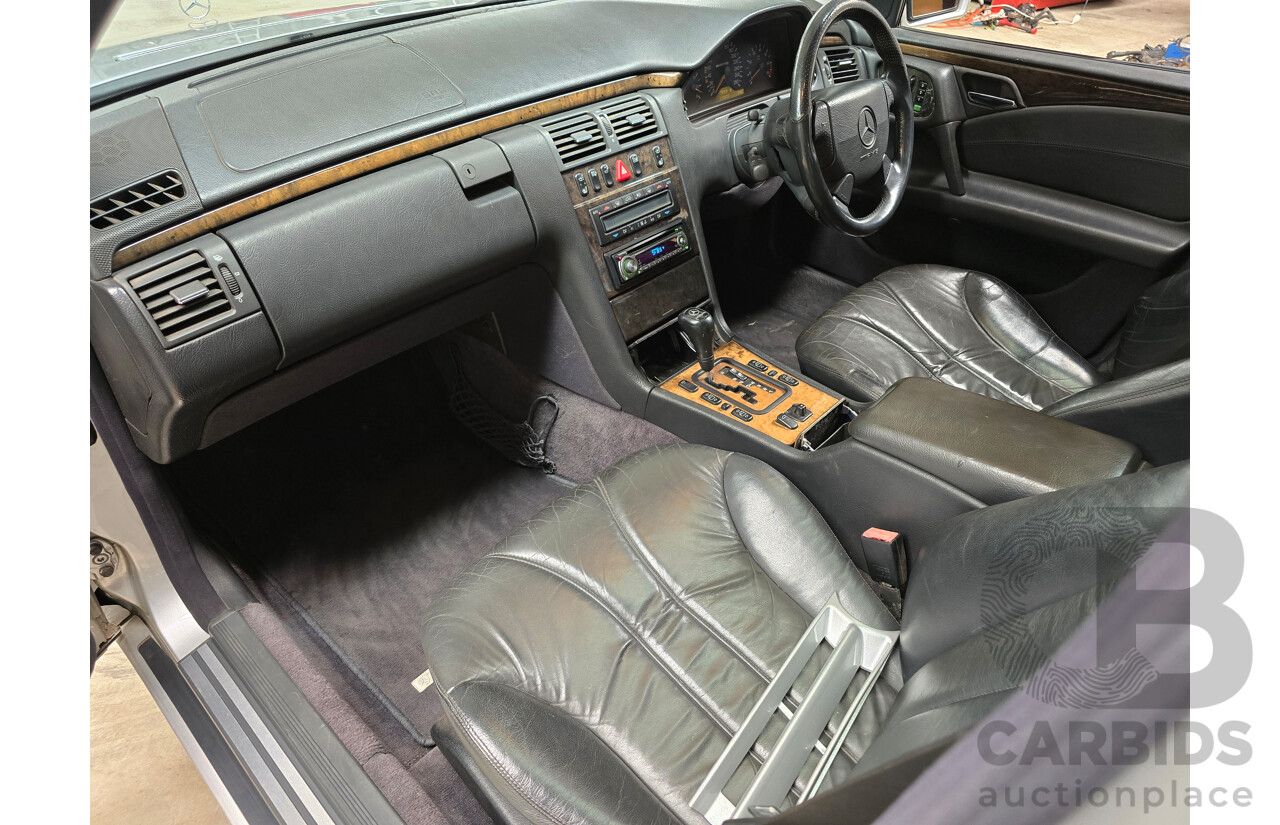 10/1998 Mercedes Benz E55 AMG W210 4d Sedan Brilliant Silver Metallic V8 5.4L