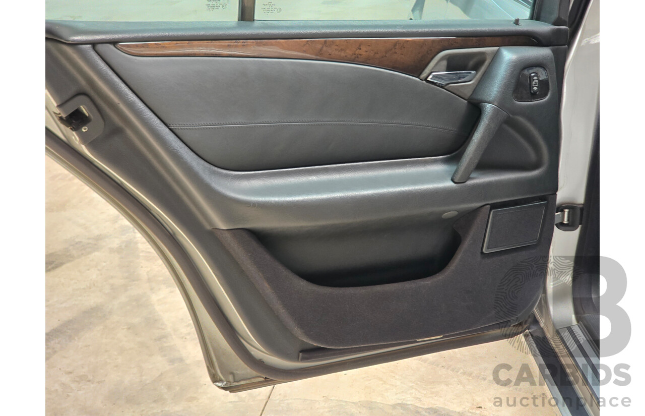 10/1998 Mercedes Benz E55 AMG W210 4d Sedan Brilliant Silver Metallic V8 5.4L