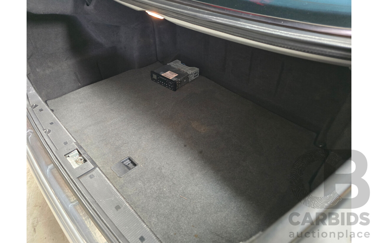 10/1998 Mercedes Benz E55 AMG W210 4d Sedan Brilliant Silver Metallic V8 5.4L