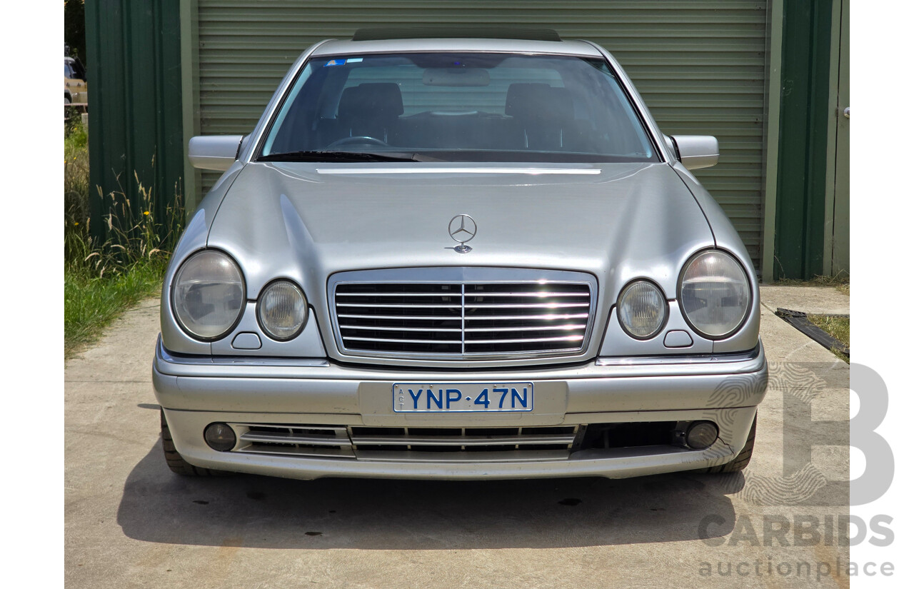 10/1998 Mercedes Benz E55 AMG W210 4d Sedan Brilliant Silver Metallic V8 5.4L
