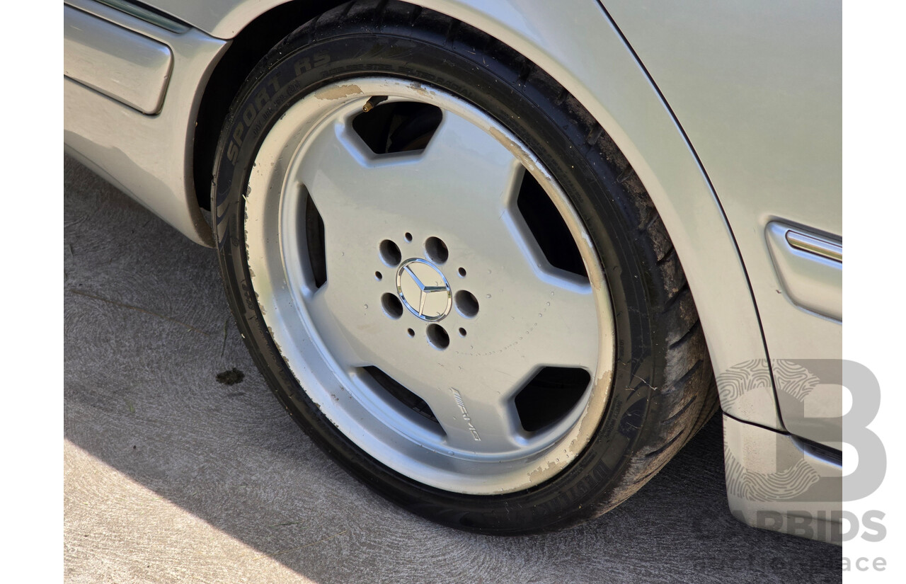 10/1998 Mercedes Benz E55 AMG W210 4d Sedan Brilliant Silver Metallic V8 5.4L