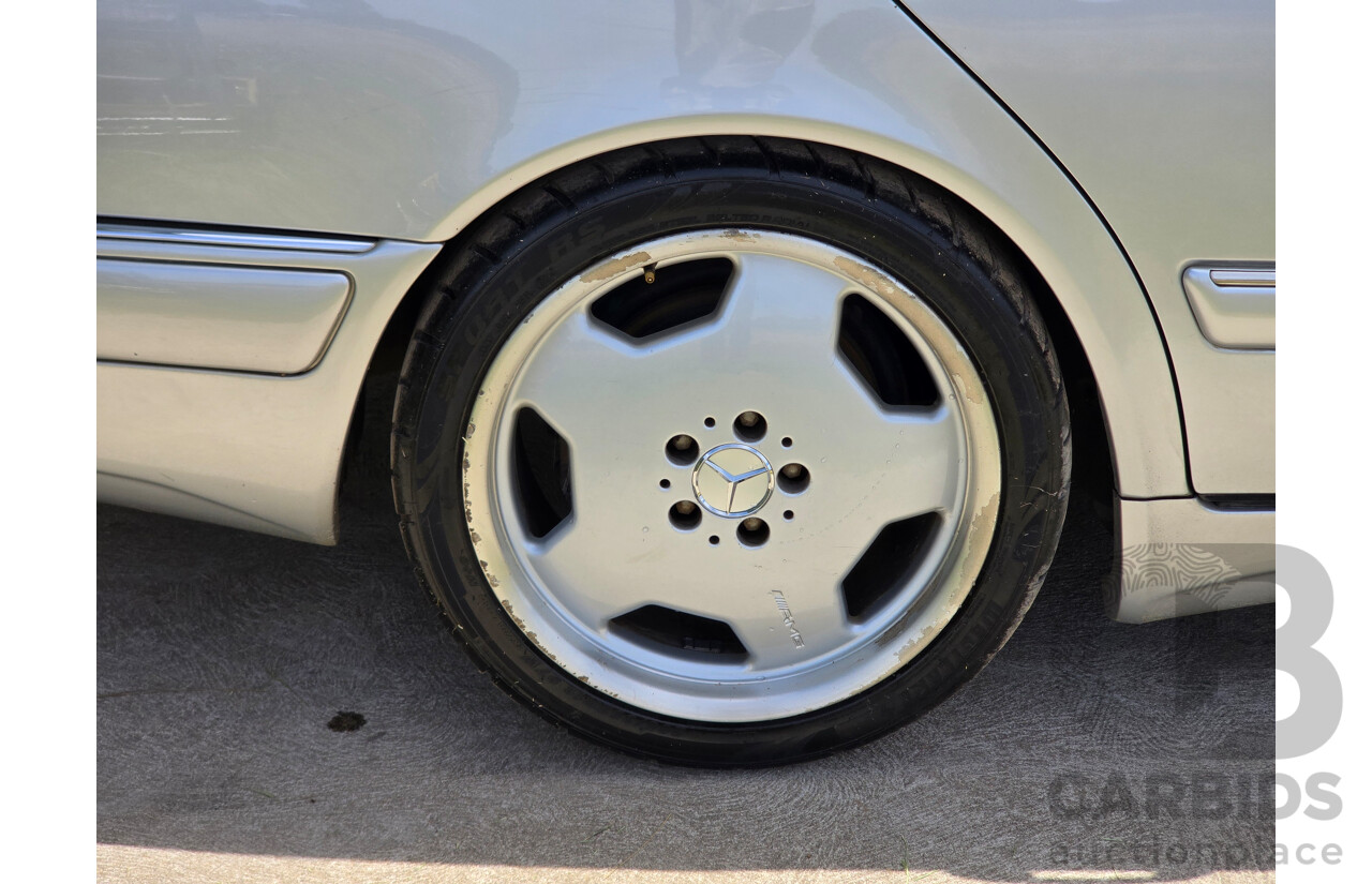 10/1998 Mercedes Benz E55 AMG W210 4d Sedan Brilliant Silver Metallic V8 5.4L