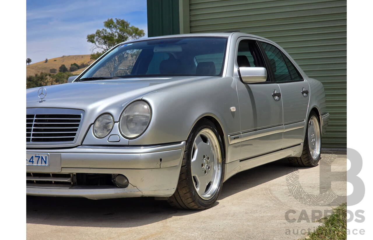10/1998 Mercedes Benz E55 AMG W210 4d Sedan Brilliant Silver Metallic V8 5.4L