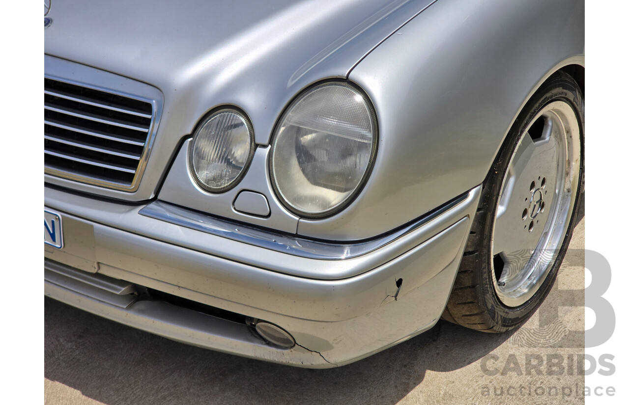 10/1998 Mercedes Benz E55 AMG W210 4d Sedan Brilliant Silver Metallic V8 5.4L