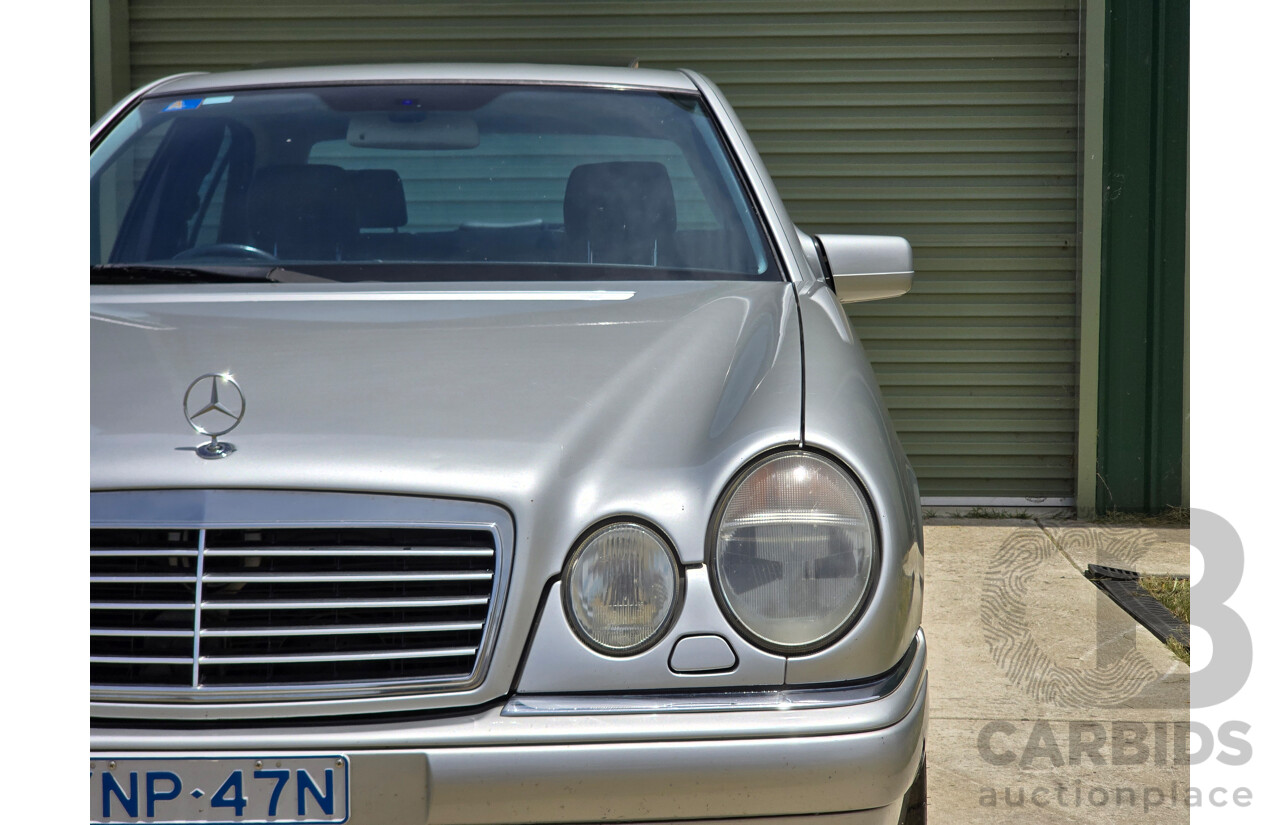 10/1998 Mercedes Benz E55 AMG W210 4d Sedan Brilliant Silver Metallic V8 5.4L
