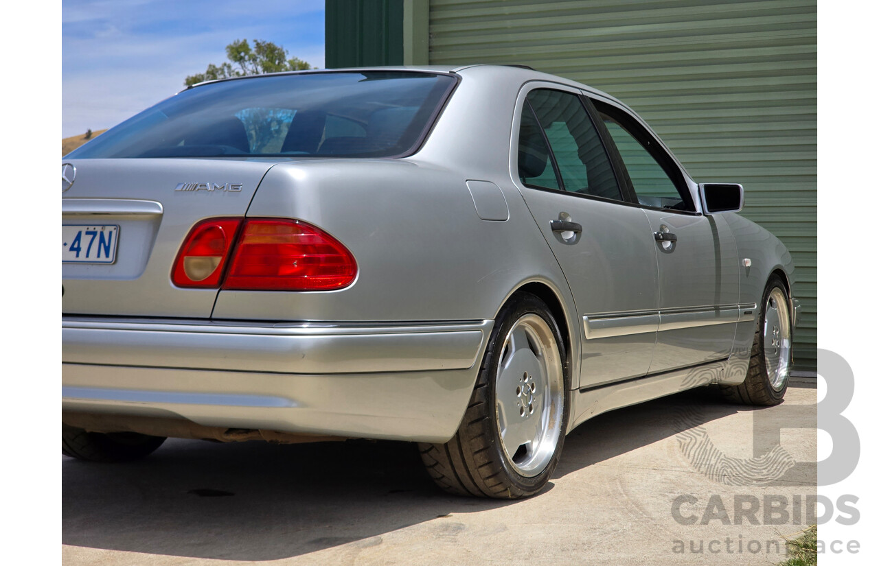 10/1998 Mercedes Benz E55 AMG W210 4d Sedan Brilliant Silver Metallic V8 5.4L