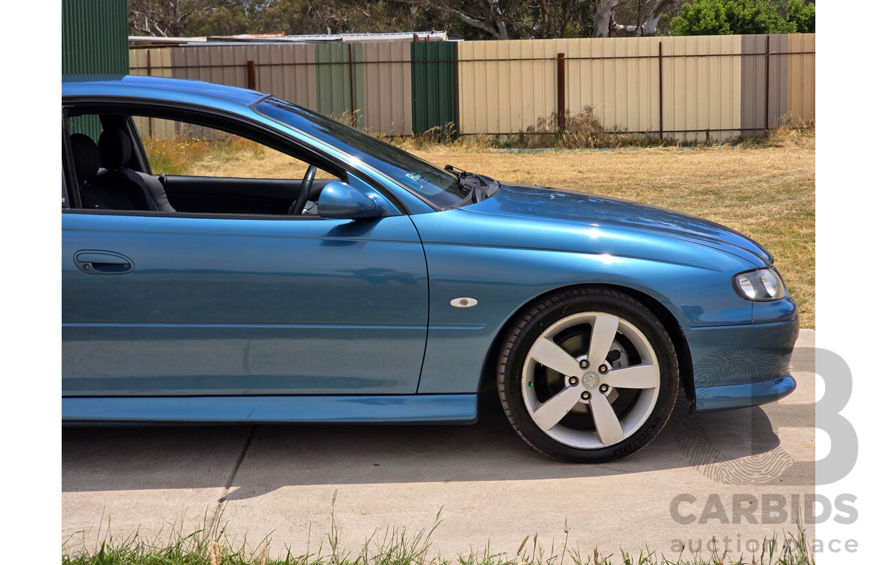 9/2003 Holden Monaro CV8 V2 Series III 2d Coupe Barbados Metallic Blue V8 5.7L