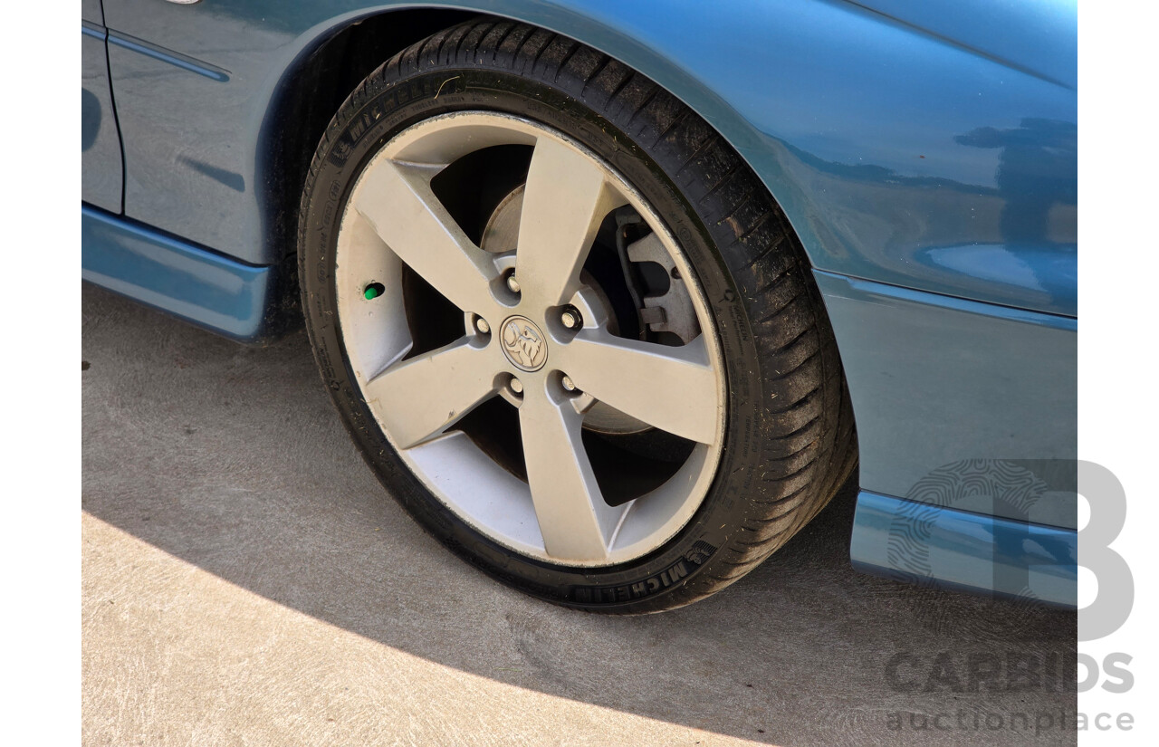 9/2003 Holden Monaro CV8 V2 Series III 2d Coupe Barbados Metallic Blue V8 5.7L