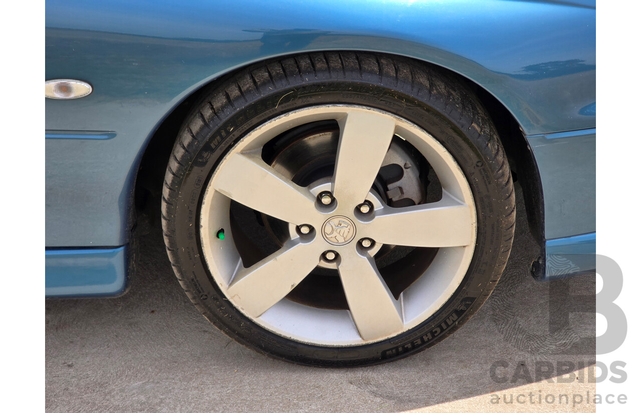 9/2003 Holden Monaro CV8 V2 Series III 2d Coupe Barbados Metallic Blue V8 5.7L