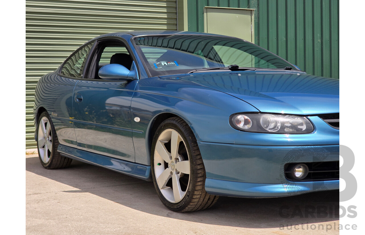 9/2003 Holden Monaro CV8 V2 Series III 2d Coupe Barbados Metallic Blue V8 5.7L