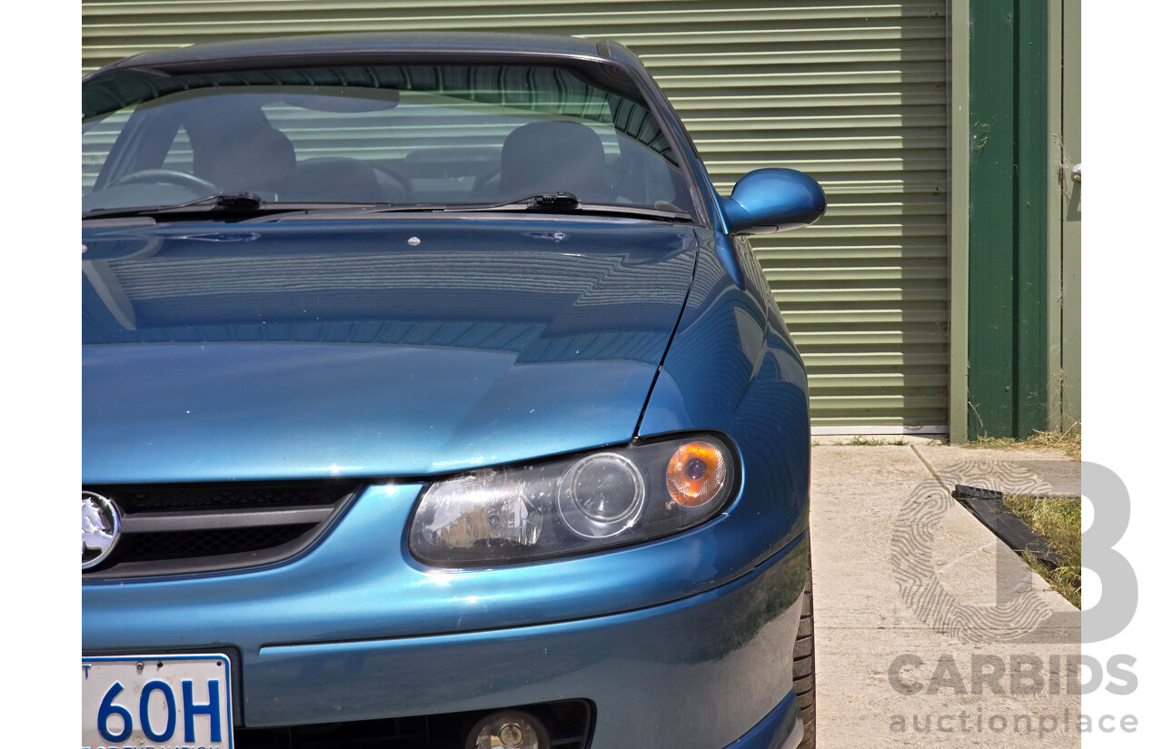 9/2003 Holden Monaro CV8 V2 Series III 2d Coupe Barbados Metallic Blue V8 5.7L