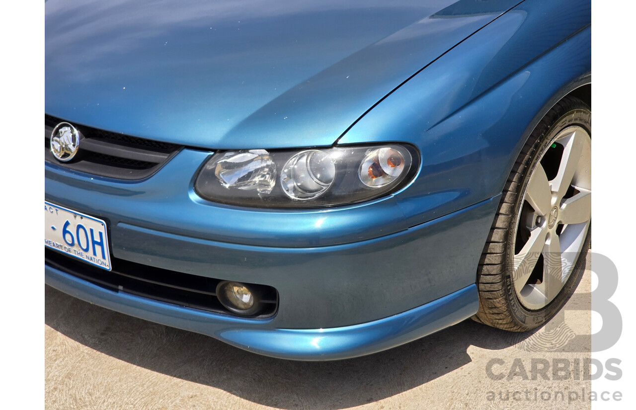 9/2003 Holden Monaro CV8 V2 Series III 2d Coupe Barbados Metallic Blue V8 5.7L