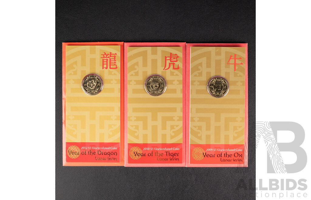 Australian One Dollar Coins, Lunar Series . 2012 Dragon, 2010 Tiger. 2009 Ox.