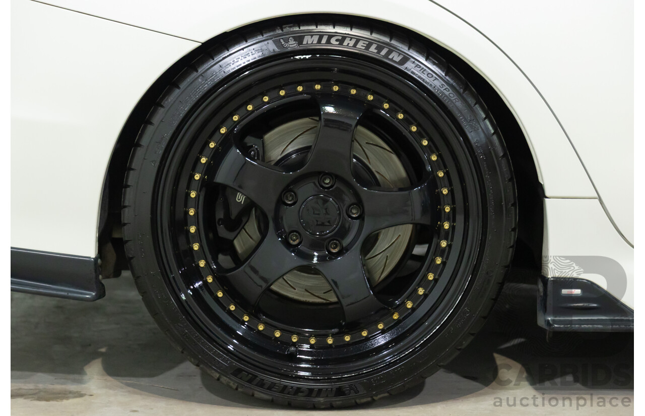 02/2015 Subaru WRX STi Premium (AWD) MY15 4d Sedan Crystal White Turbo 2.5L