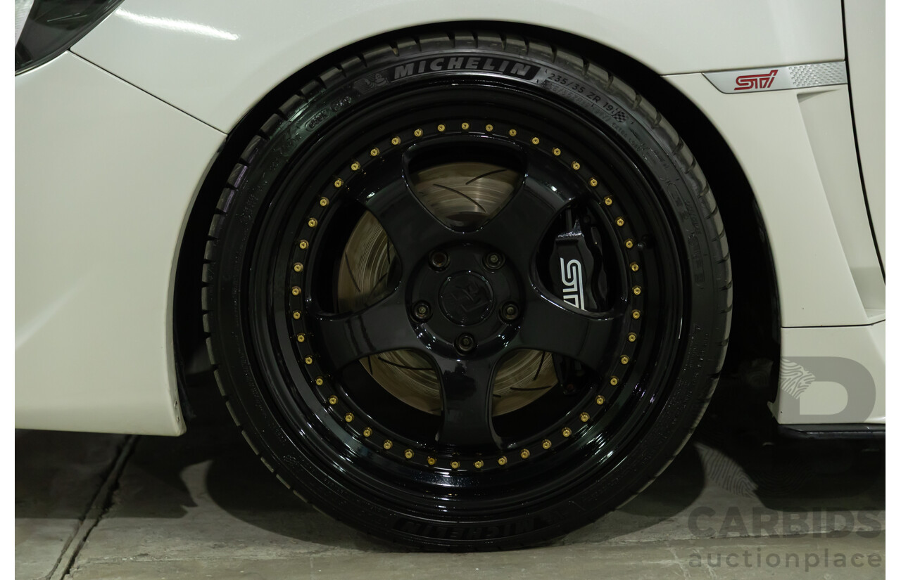 02/2015 Subaru WRX STi Premium (AWD) MY15 4d Sedan Crystal White Turbo 2.5L