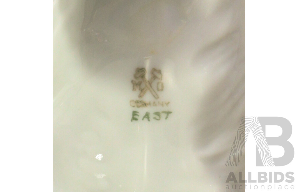 Three Porcelain Dogs Including a Pointer, Terrier and Irish Setter with Duck in Mouth