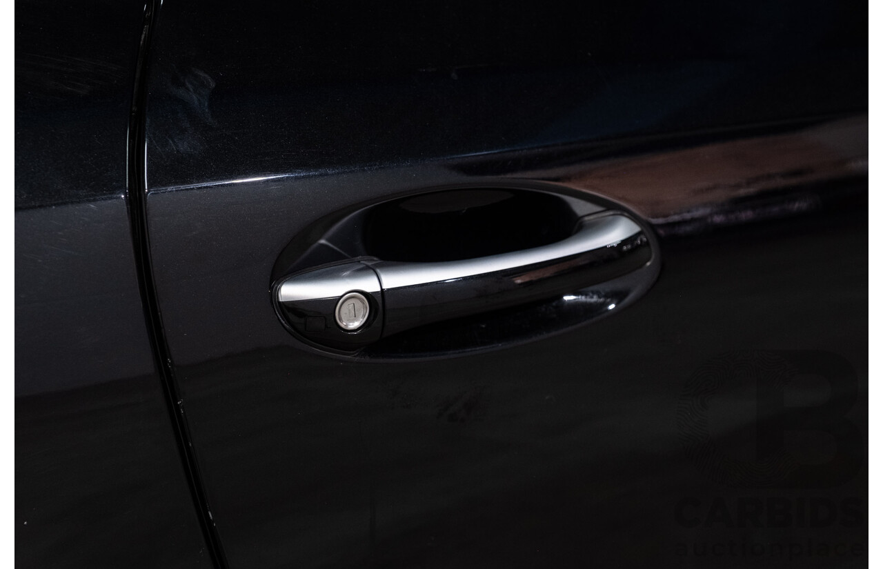 09/2005 Mercedes-Benz SL350 (RWD) R230 2D Convertible Obsidian Black Metallic V6 3.7L