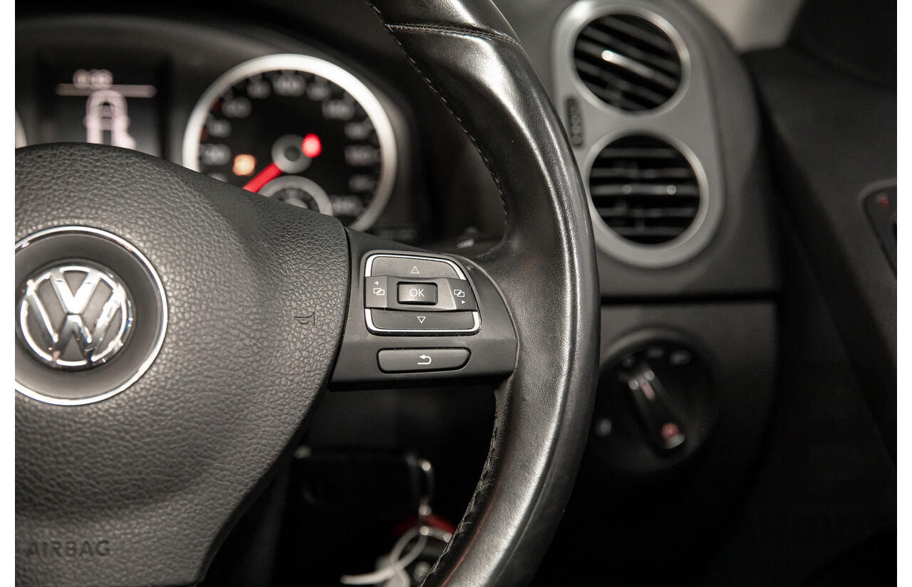 7/2014 Volkswagen Tiguan 118 TSI (4x2) 5NC MY14.5 4d Wagon Pure White Twincharged 1.4L