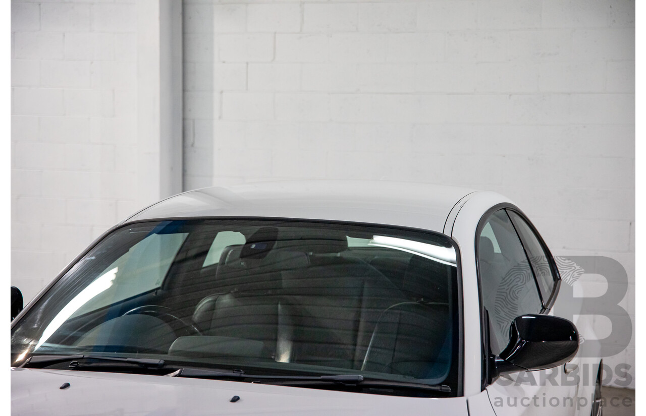 4/2013 BMW 120i M Sport E82 MY12.5 2d Coupe Alpine White 2.0L