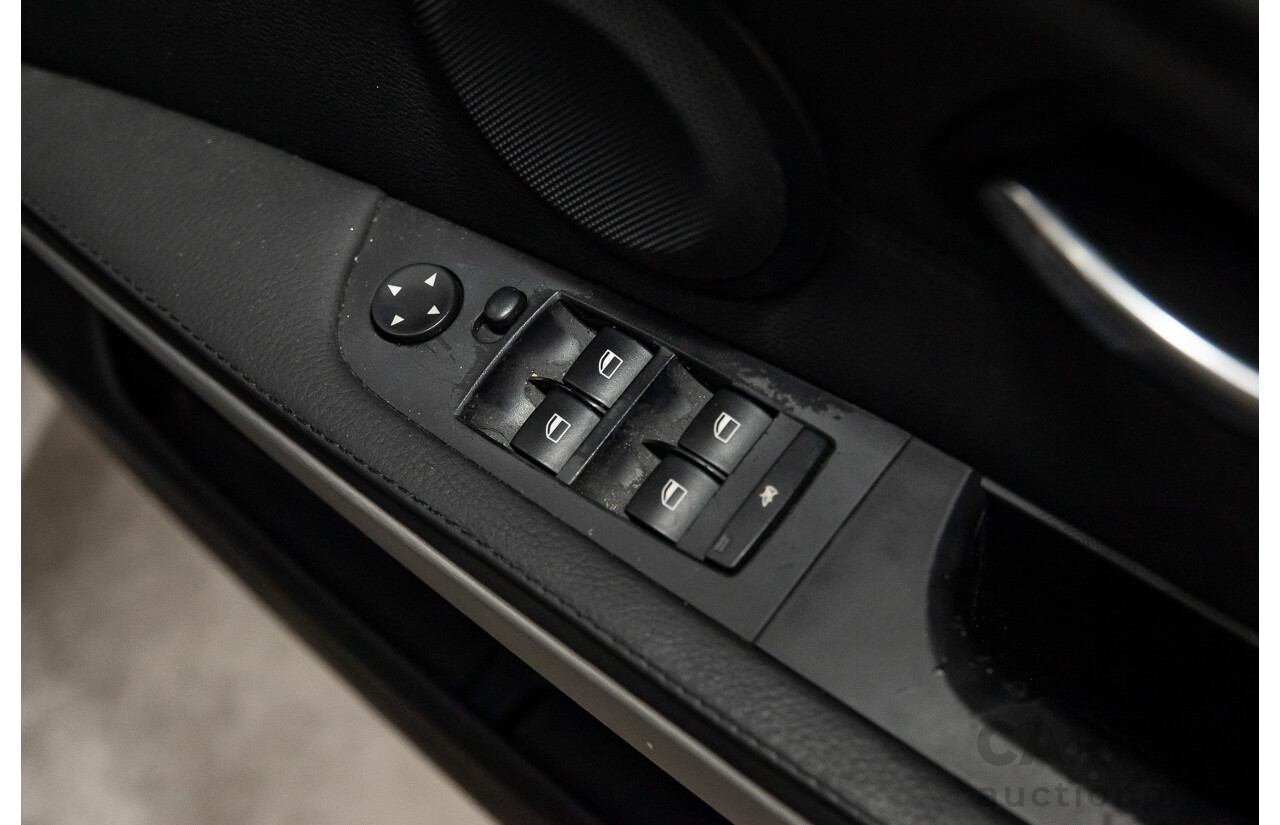 5/2009 BMW 325i E90 MY09 4d Sedan Titanium Silver Metallic 2.5L