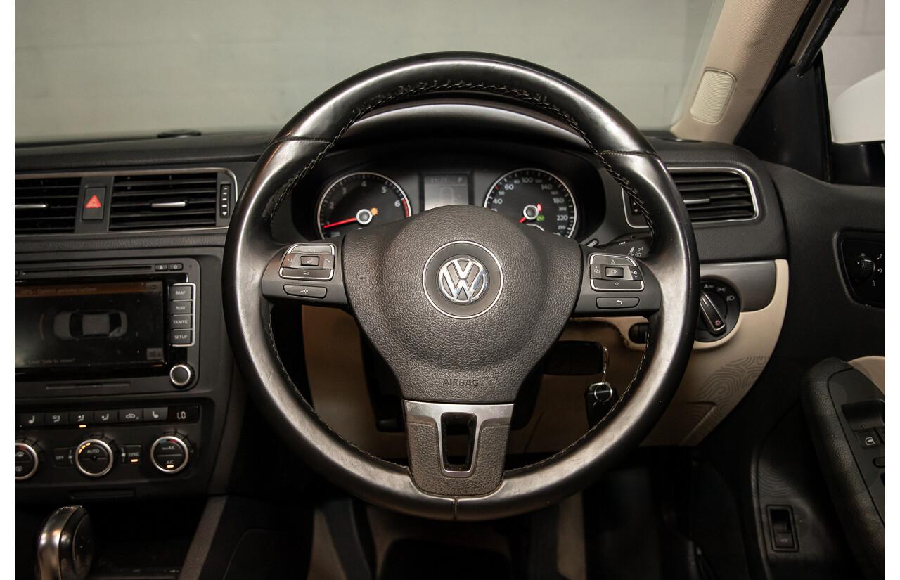 11/2012 Volkswagen Jetta 147 TSI Highline 1KM MY13 4d Sedan Candy White Turbo 2.0L