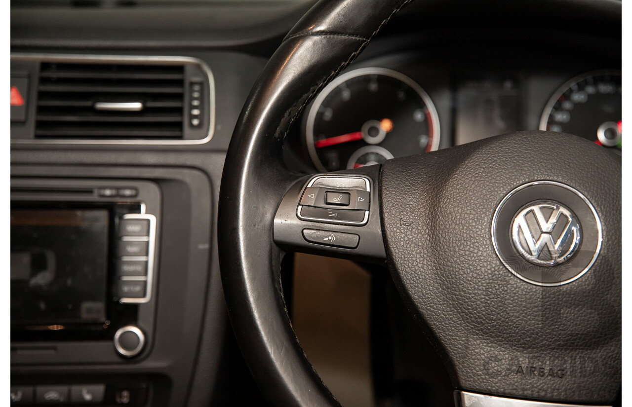 11/2012 Volkswagen Jetta 147 TSI Highline 1KM MY13 4d Sedan Candy White Turbo 2.0L