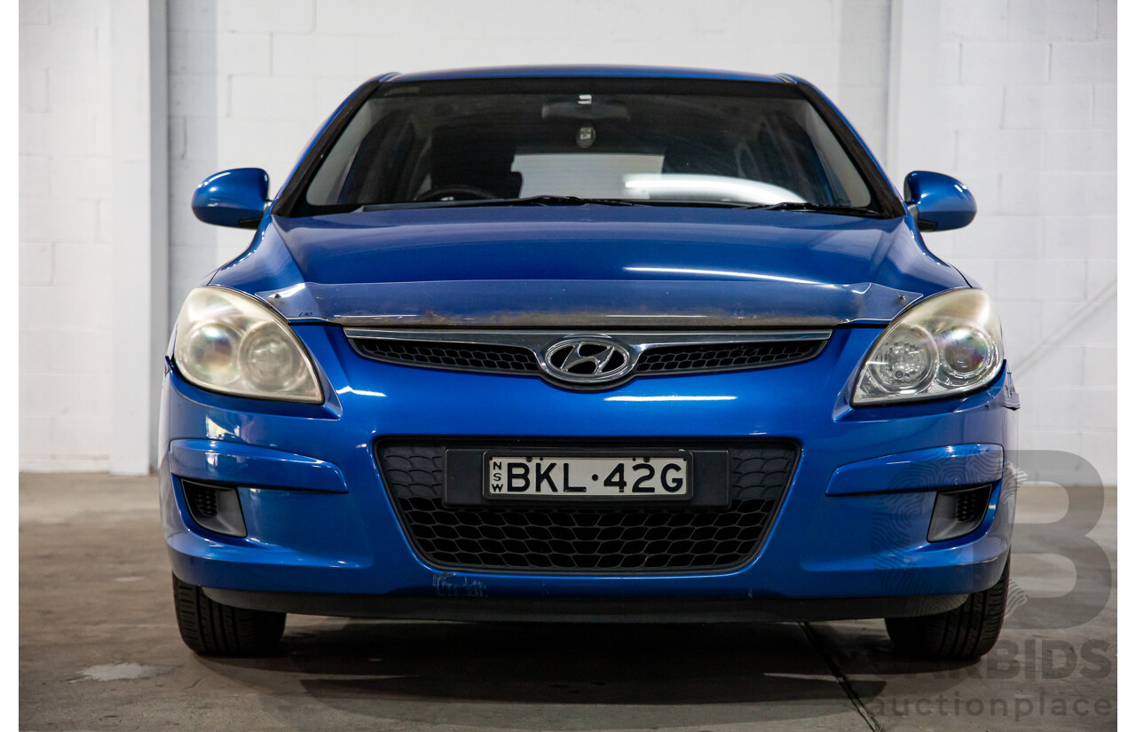 6/2009 Hyundai i30 SX 1.6 CRDi FD MY09 5d Hatchback Vivid Blue Turbo Diesel 1.6L