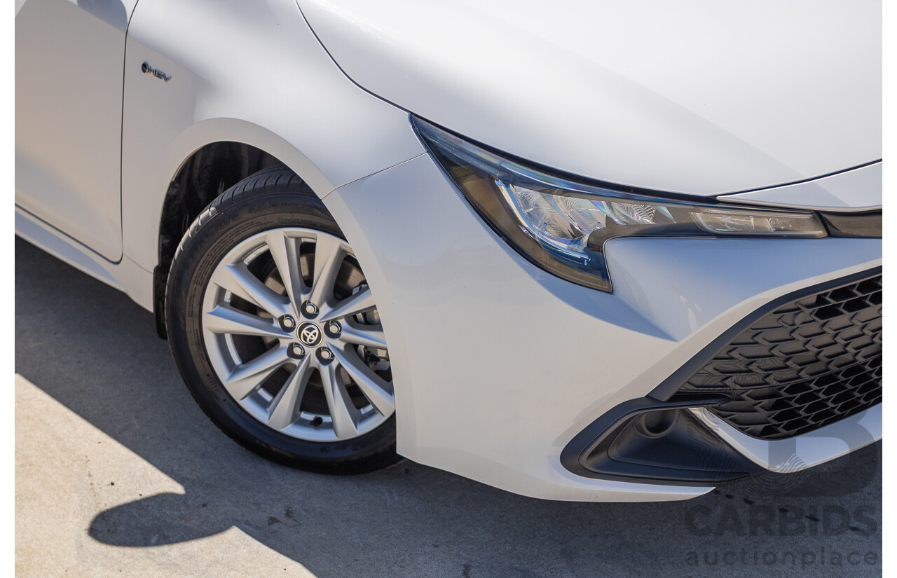 11/2024 Toyota Corolla Ascent Sport Hybrid ZWE219R 5D Hatchback Glacier White 1.8L - 70kw Hybrid