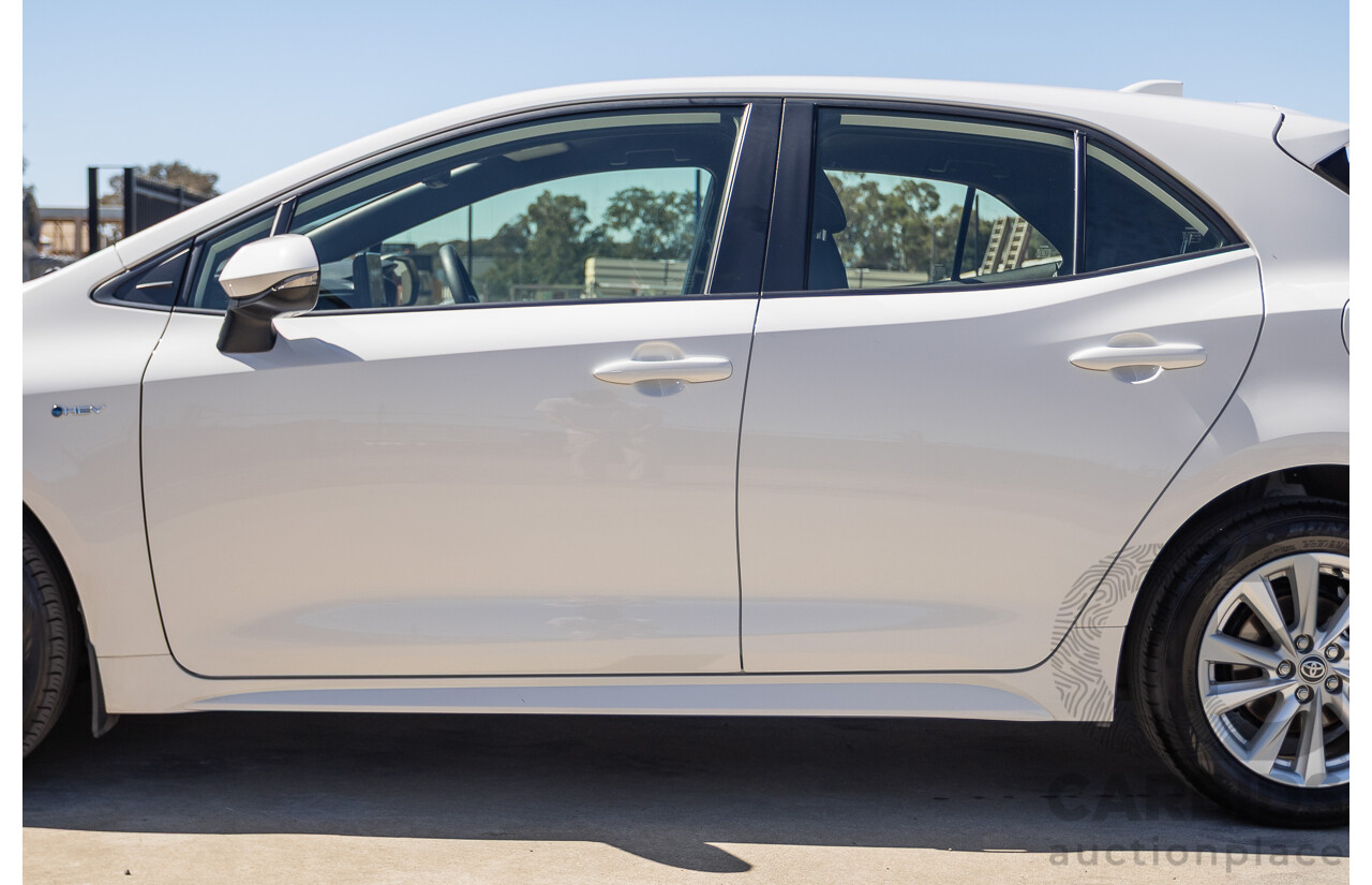 11/2024 Toyota Corolla Ascent Sport Hybrid ZWE219R 5D Hatchback Glacier White 1.8L - 70kw Hybrid