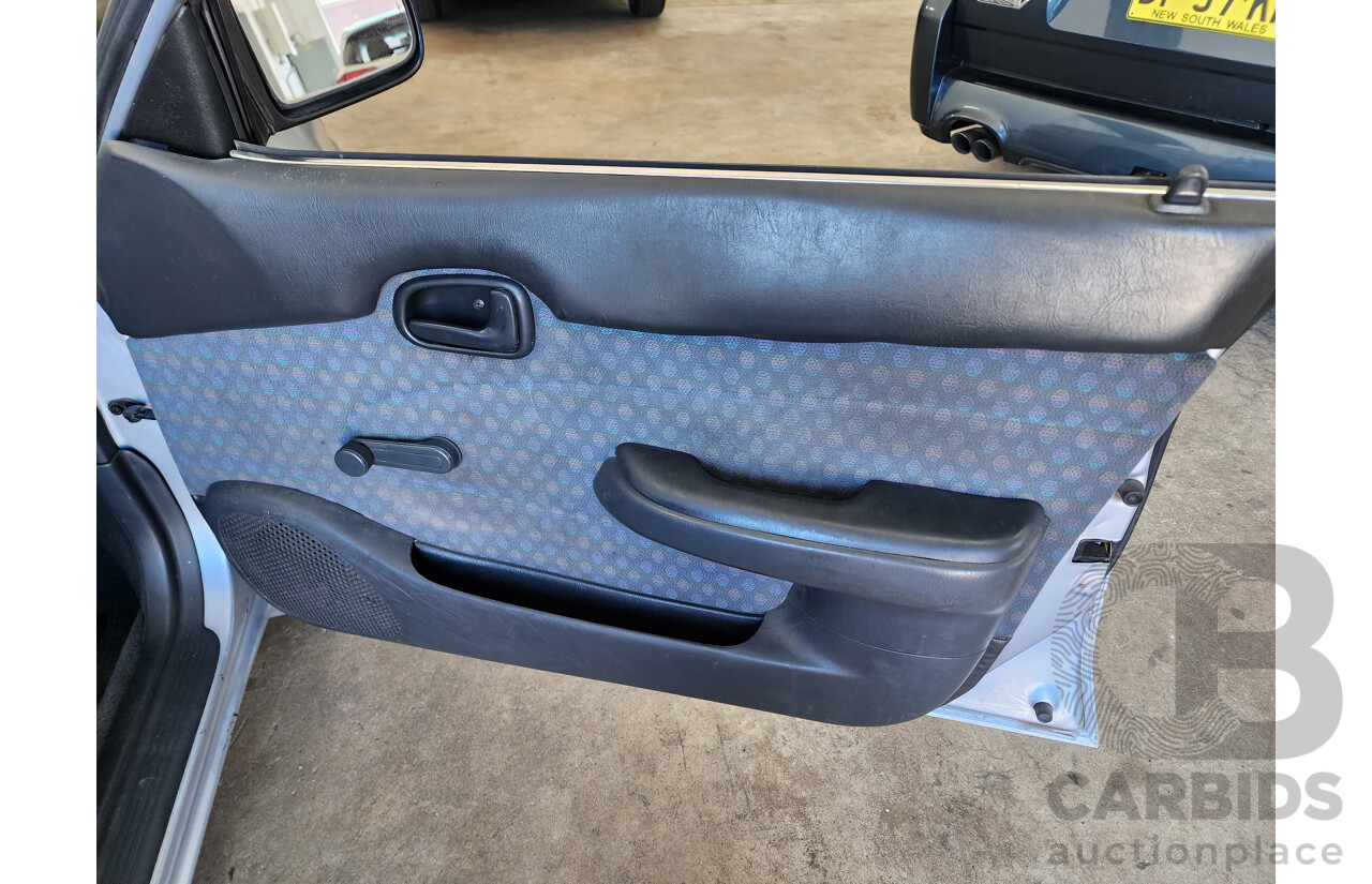 3/1997 Toyota Corolla Conquest AE102R 4d Sedan Silver 1.8L